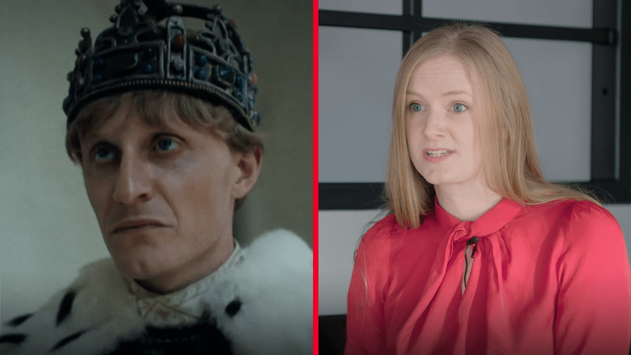 A woman wearing a red top next to a late medieval king
