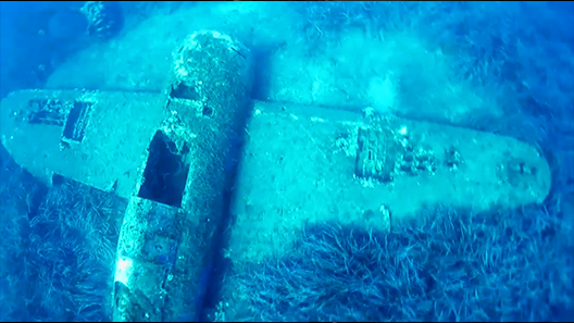 The wreck of a WW2 plane under water