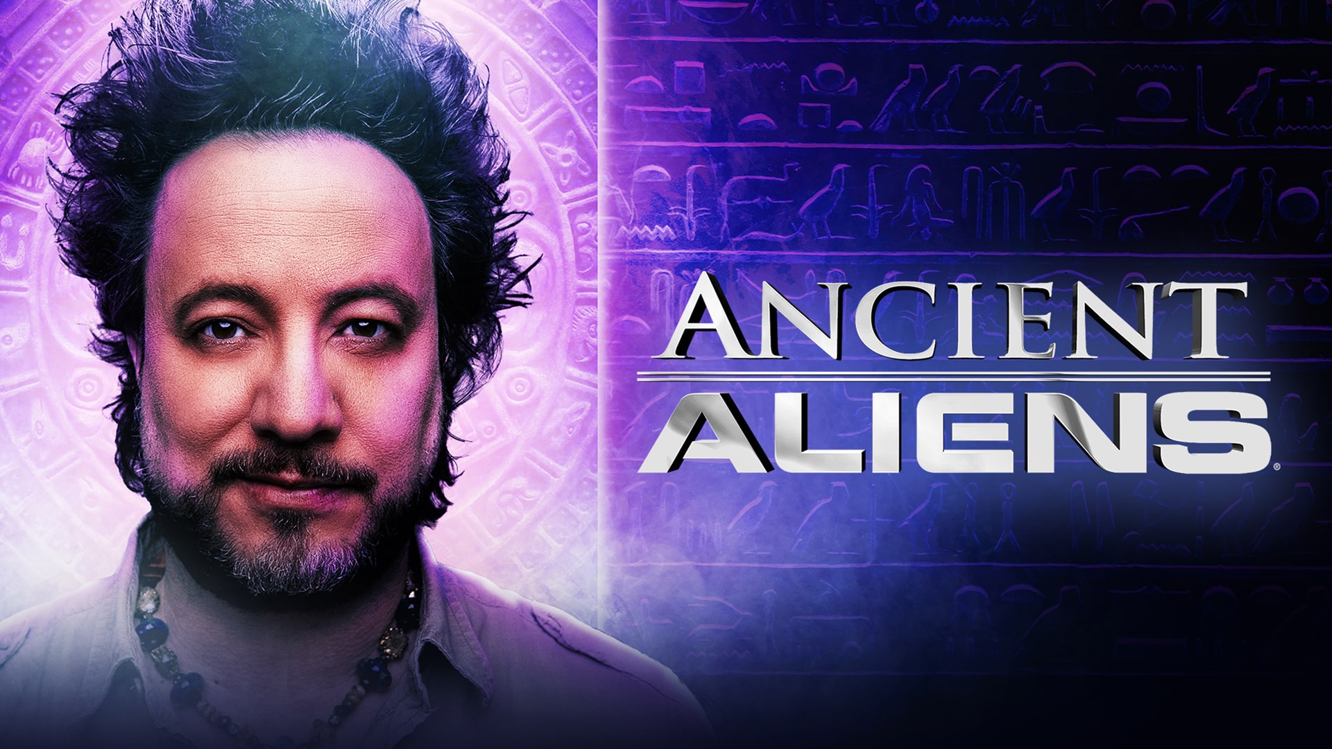 'ANCIENT ALIENS' - Giorgio A Tsoukalos in front of some hieroglyphs