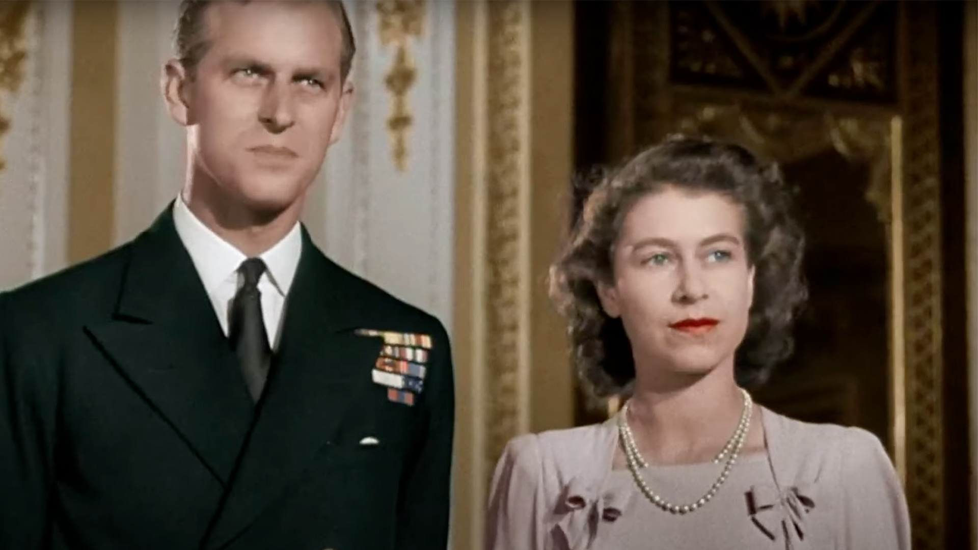 Colourised image of Queen Elizabeth II and Prince Philip standing next to each other as young adults