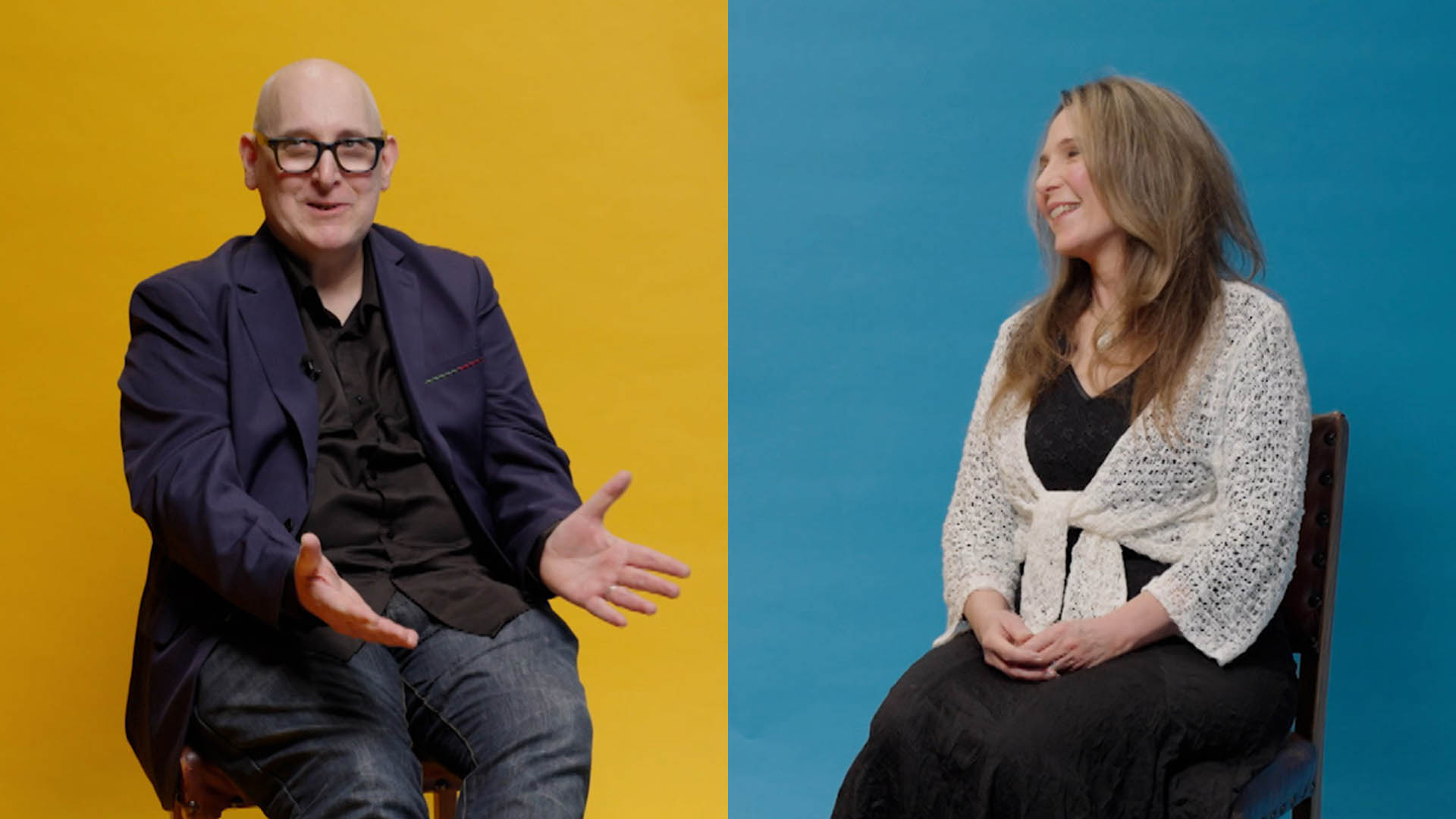 A man and a woman sitting either side of a divided background which is yellow on the left and blue on the right
