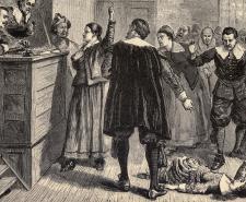 Salem Witch Trials: A women protests as one of her accusers, a young girl, appears to have convulsions.