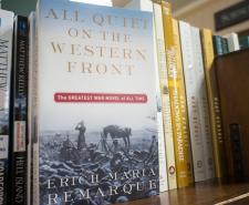 A copy of 'All Quiet on the Western Front' on a bookshelf