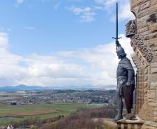 Statue of William Wallace raising his sword at the National Wallace Monument in Stirling