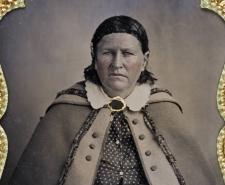 Black and white tintype of Cynthia Ann Parker in a golden frame