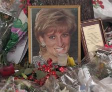 A photograph of Princess Diana surrounded by flowers and notes from mourners following her death