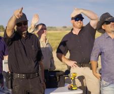 (L - R) Travis Taylor, Bryant ‘Dragon’ Arnold, Erik Bard, Kaleb Bench and Thomas Winterton look to the sky. Bryant is pointing at something in the sky while Brandon, Erik and Kaleb shield their eyes from the sun