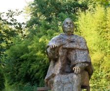 A sculpture of Baba Vanga in a park