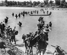 Gurkha Rifles of the British Indian Army crossing the Irrawaddy River
