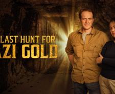 Guy Walters and Justine Ostrowska standing in a cave next to the show title