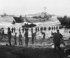 Troops from 51st Highland Division unloading stores from tank landing craft on the opening day of the Allied invasion of Sicily, 10 July 1943