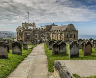 Looking down at St Mary's Church in Whitby with the sea in the background