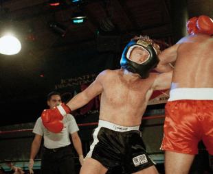 Danny Bonaduce and Donny Osmond fighting in a boxing match