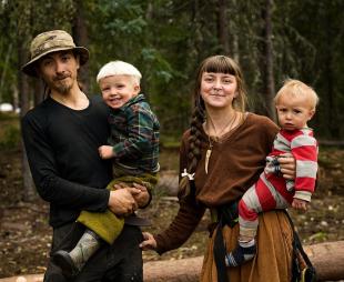 Chance and Soraya Painter holding two of their children