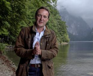 Guy Walters standing in front of Lake Toplitz