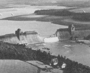 Photograph of the breached Möhne Dam showing the extent of the flooding