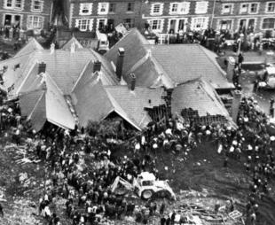 Aerial image of rescuers searching for survivors at the school