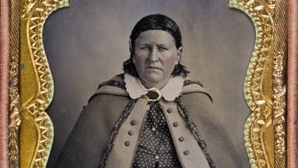 Black and white tintype of Cynthia Ann Parker in a golden frame