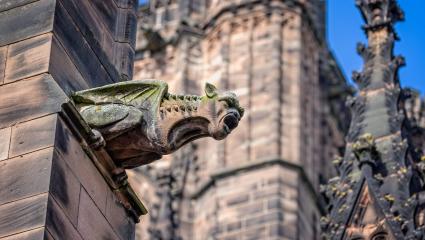 Close up of a gargoyle on the outside of Chester Cathedral
