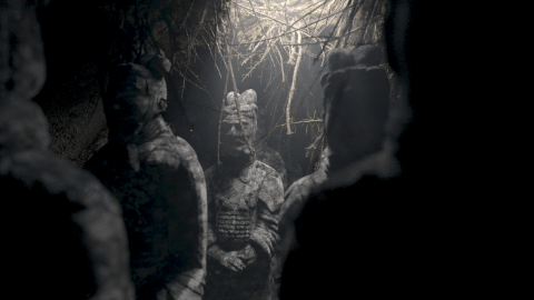 An image showing Terracotta Soldiers shrouded by darkness