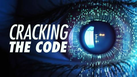 'CRACKING THE CODE' - A closeup of a human eye with circuit board patterns around it