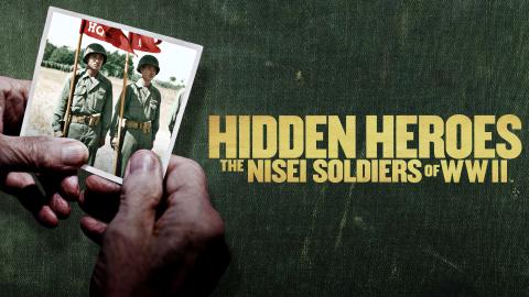 'HIDDEN HEROES - THE NISEI SOLDIERS OF WWII' - An old man's hands hold a colourised photograph of two Japanese WWII soldiers