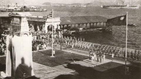 A ceremony to celebrate the liberation of Hong Kong at the Hong Kong Cenotaph in 1945