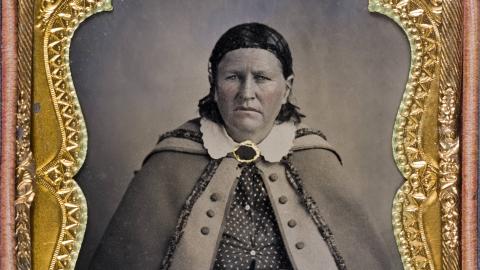 Black and white tintype of Cynthia Ann Parker in a golden frame