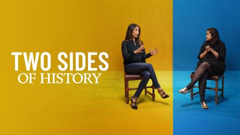 'TWO SIDES OF HISTORY' - Two women sitting on chairs either side of a divided colour background. One side if yellow, the other is blue