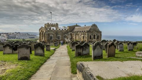 Looking down at St Mary's Church in Whitby with the sea in the background