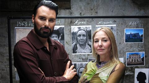 Rylan Clark and Professor Alice Roberts stand in front of an evidence board