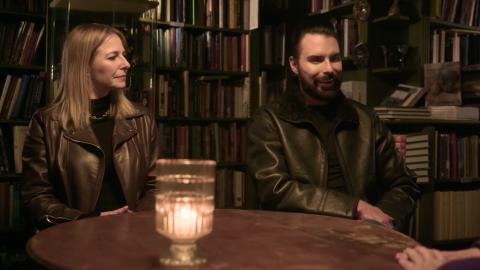 Professor Alice Roberts and Rylan Clark sit at a round table with a candle in the middle