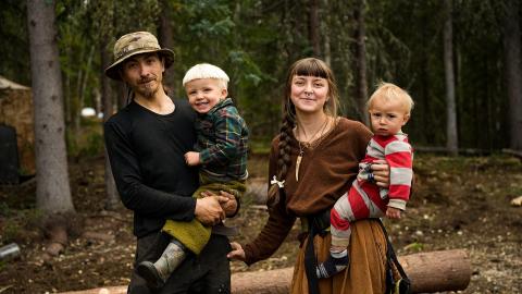 Chance and Soraya Painter holding two of their children
