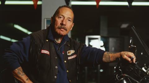 Sonny Barger sitting on a Harley Davidson motorcycle