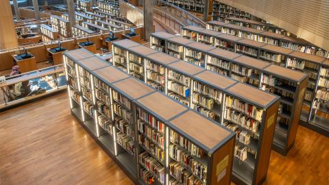 Rows of books in the University House Alexandria Library