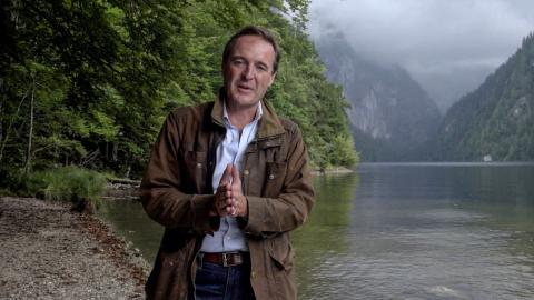 Guy Walters standing in front of Lake Toplitz