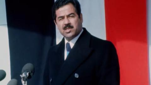 Saddam Hussein giving a speech