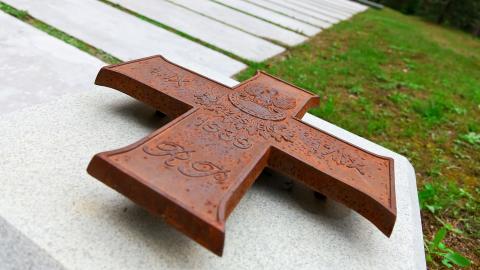 Memorial cross on a graves in the Katyn Polish War Cemetary