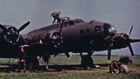 WWII pilots climbing into a plane