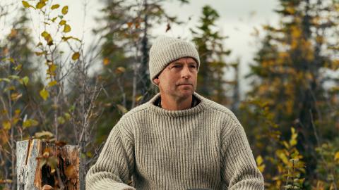 Andrew Price sitting in the forest