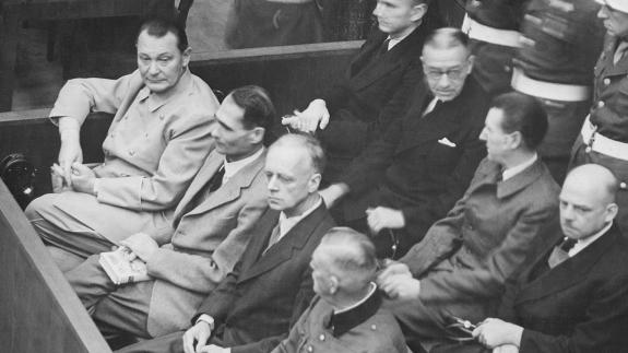 Nuremberg Trials. Defendants in their dock, circa 1945-1946, Herman Göring left | Wikipedia | Public Domain