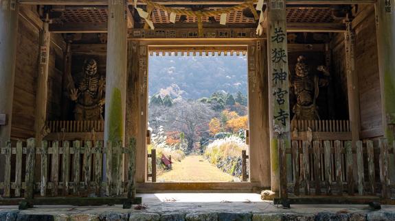A view through an open door of a Japanese Temple on the Mackerel highway
