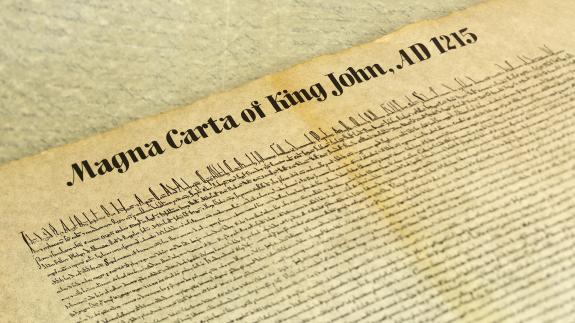 Magna Carta Libertatum, is an eight-hundred year-old English legal charter that required King John of England to proclaim certain rights and accept that his will could be bound by the law.