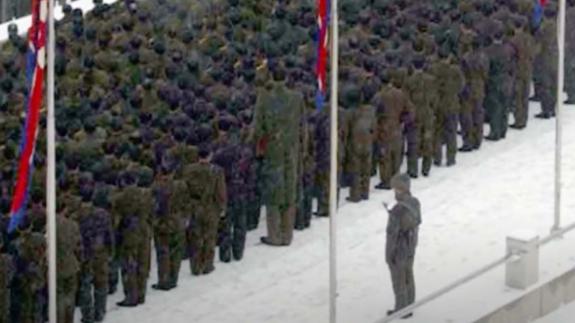 Image appears to show an incredibly tall North Korean soldier standing in formation