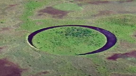 A circular island in the middle of a swamp