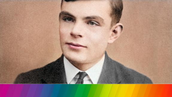 A digitally colourised photograph of Alan Turing