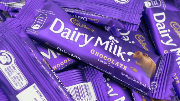 A photograph showing bars of Cadbury Dairy Milk Chocolate