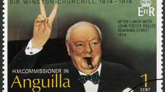 A postal stamp showing Churchill making a victory sign