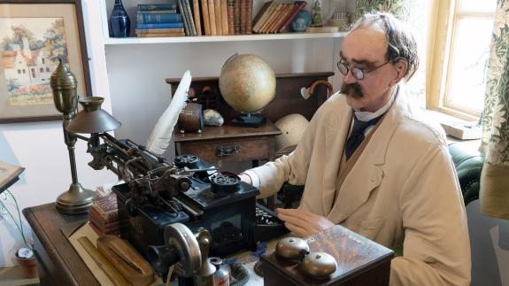 A wax work of Joseph Rudyard Kipling in his office