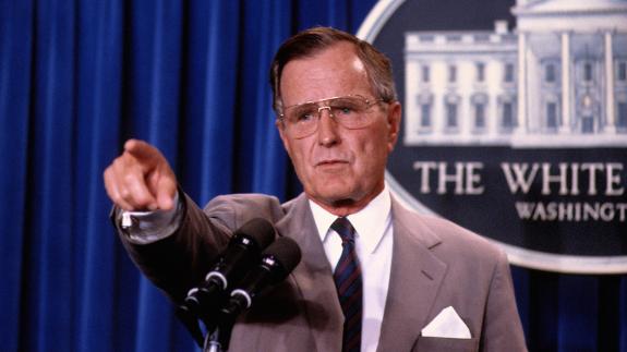 President George H.W. Bush in the press briefing room at the White House in 1990
